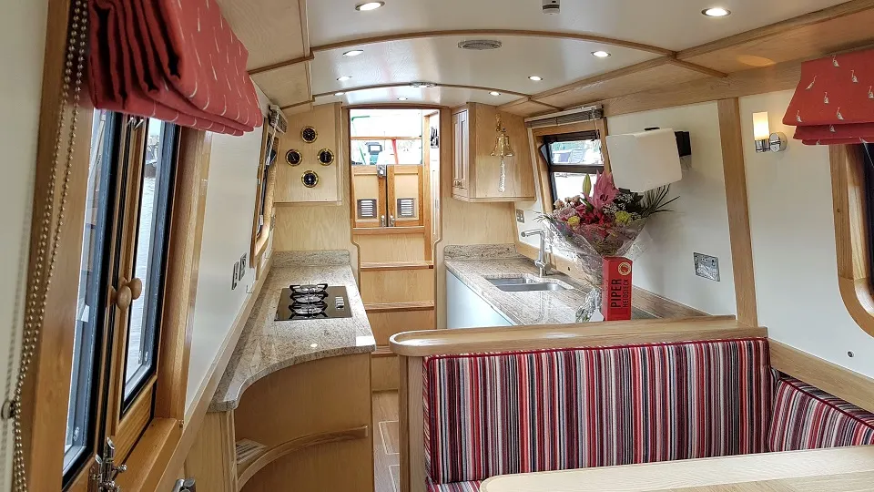 Inside Lily Pad, looking along the galley and dinette